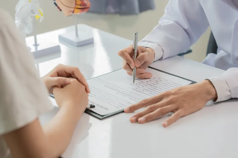 Doctor and patient discussing treatment options during a consultation