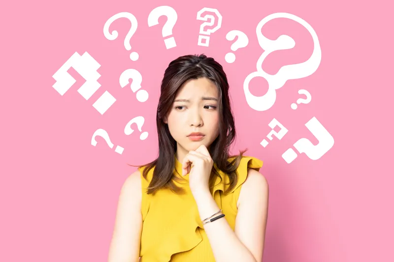 Woman considering questions to ask
